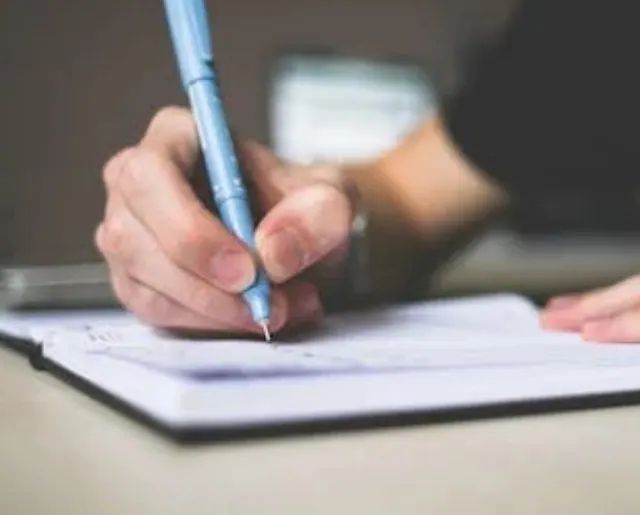 Handwritten retirement bucket list of places to travel and things to try