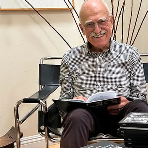 Steven with their own Meminto book