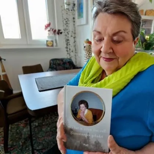 Barbara with their own Meminto book