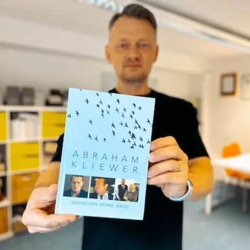 Albert with their own Meminto book