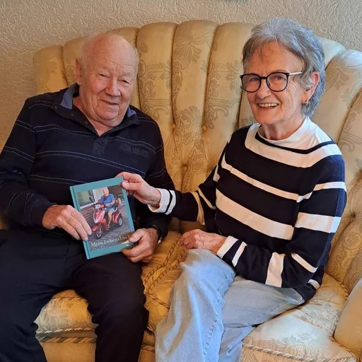 Johann with their own Meminto book